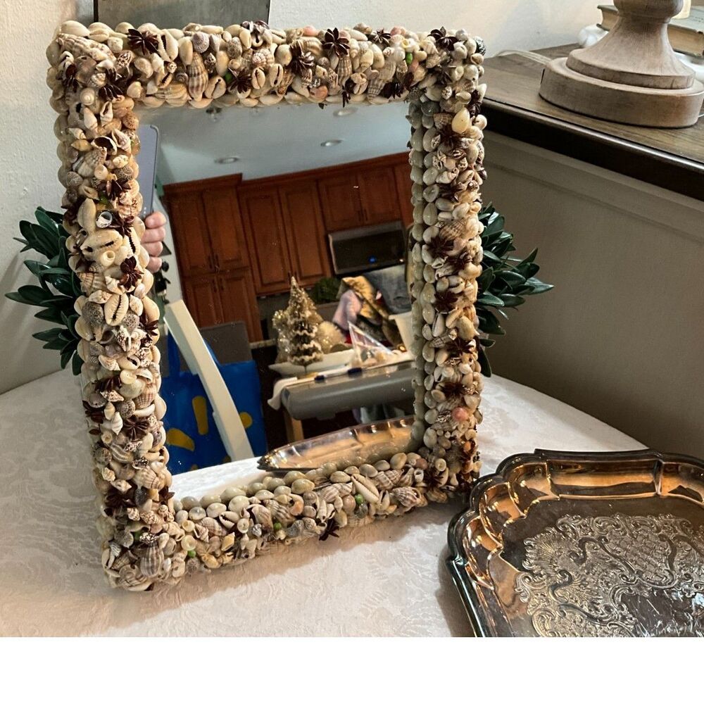 Stunning vintage shell mirror; full shell frame beautiful coastal decor item